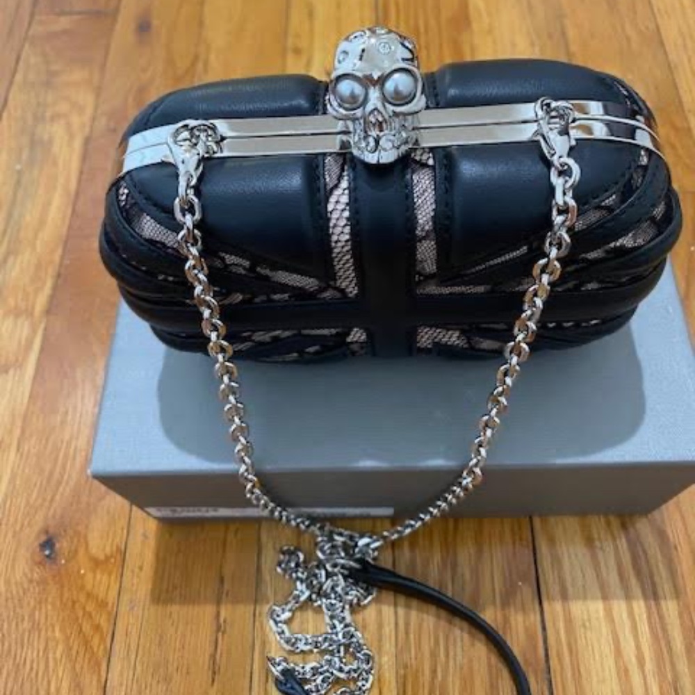 100% Authentic Alexander McQueen Black and Beige Britannia Skull Clutch w/strap